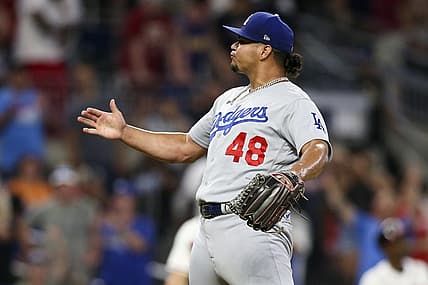 Jun 26, 2022; Atlanta, Georgia, USA; Los Angeles Dodgers relief pitcher Brusdar Graterol (48) celebrates after a victory against the Atlanta Braves at Truist Park. Mandatory Credit: Brett Davis-USA TODAY Sports
