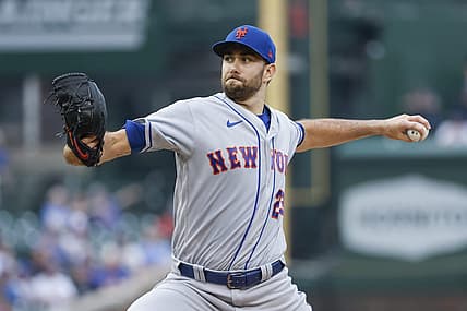 Jul 17, 2022; Chicago, Illinois, USA; New York Mets starting pitcher David Peterson (23) delivers against the Chicago Cubs during the first inning at Wrigley Field. Mandatory Credit: Kamil Krzaczynski-USA TODAY Sports