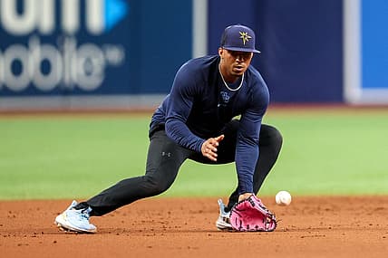 Aug 23, 2022; St. Petersburg, Florida, USA;  Tampa Bay Rays shortstop Wander Franco (5) takes ground balls before a game against the Los Angeles Angels at Tropicana Field. Mandatory Credit: Nathan Ray Seebeck-USA TODAY Sports