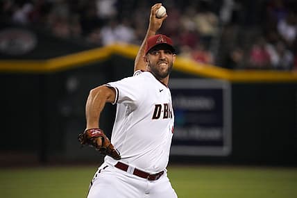 Aug 29, 2022; Phoenix, Arizona, USA; Arizona Diamondbacks starting pitcher Madison Bumgarner (40) pitches against the Philadelphia Phillies during the first inning at Chase Field. Mandatory Credit: Joe Camporeale-USA TODAY Sports