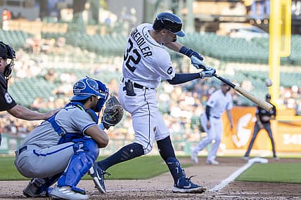 Sep 3, 2022; Detroit, Michigan, USA; Detroit Tigers shortstop Ryan Kreidler (32) hits a sacrifice fly for an RBI against the Kansas City Royals in the second inning at Comerica Park. Mandatory Credit: David Reginek-USA TODAY Sports