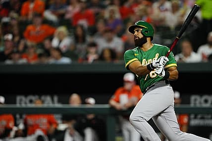 Sep 3, 2022; Baltimore, Maryland, USA; Oakland Athletics first baseman Dermis Garcia (76) hits a single against the Baltimore Orioles during the fourth inning at Oriole Park at Camden Yards. Mandatory Credit: Brent Skeen-USA TODAY Sports