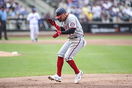 Sep 4, 2022; New York City, New York, USA;  Washington Nationals third baseman Ildemaro Vargas (14) celebrates after hitting a two run single in the third inning against the New York Mets at Citi Field. Mandatory Credit: Wendell Cruz-USA TODAY Sports