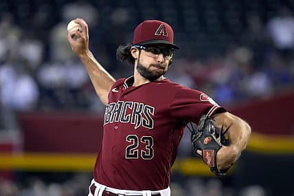 Sep 4, 2022; Phoenix, Arizona, USA; Arizona Diamondbacks starting pitcher Zac Gallen (23) throws against the Milwaukee Brewers in the first inning at Chase Field. Mandatory Credit: Rick Scuteri-USA TODAY Sports
