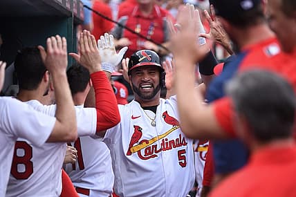 Sep 4, 2022; St. Louis, Missouri, USA; St. Louis Cardinals pinch hitter Albert Pujols (5) is greeted after hitting a two run home run against the Chicago Cubs in the eighth inning at Busch Stadium. Mandatory Credit: Joe Puetz-USA TODAY Sports