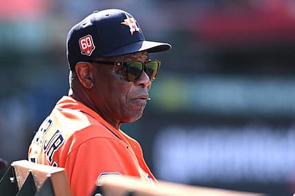 Sep 4, 2022; Anaheim, California, USA; Houston Astros manager Dusty Baker Jr. (12) looks on from the dugout during the ninth inning against the Los Angeles Angels at Angel Stadium. Mandatory Credit: Orlando Ramirez-USA TODAY Sports