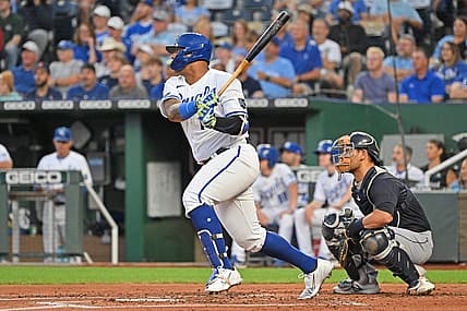 Sep 7, 2022; Kansas City, Missouri, USA; Kansas City Royals designated hitter Salvador Perez (13) singles during the first inning against the Cleveland Guardians at Kauffman Stadium. Mandatory Credit: Peter Aiken-USA TODAY Sports