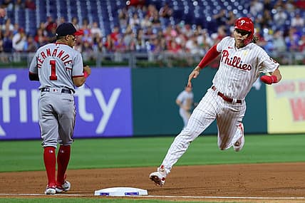 Sep 9, 2022; Philadelphia, Pennsylvania, USA; Philadelphia Phillies third baseman Alec Bohm (28) runs the bases past Washington Nationals second baseman Cesar Hernandez (1) on his way to scoring a run during the fourth inning at Citizens Bank Park. Mandatory Credit: Bill Streicher-USA TODAY Sports