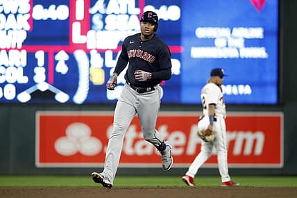 Sep 9, 2022; Minneapolis, Minnesota, USA;  Cleveland Guardians right fielder Oscar Gonzalez (39) hits a home run against Minnesota Twins at Target Field. Mandatory Credit: Bruce Kluckhohn-USA TODAY Sports