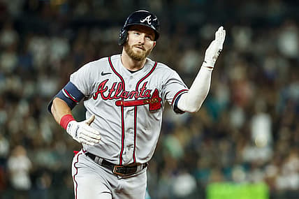 Sep 9, 2022; Seattle, Washington, USA; Atlanta Braves right fielder Robbie Grossman (15) does a tomahawk-chop after hitting a solo-home run against the Seattle Mariners during the sixth inning at T-Mobile Park. Mandatory Credit: Joe Nicholson-USA TODAY Sports