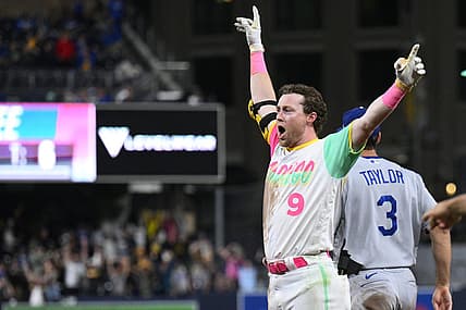 Sep 9, 2022; San Diego, California, USA; San Diego Padres second baseman Jake Cronenworth (9) celebrates after hitting a walk-off single against the Los Angeles Dodgers during the tenth inning at Petco Park. Mandatory Credit: Orlando Ramirez-USA TODAY Sports