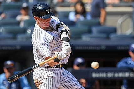 Sep 10, 2022; Bronx, New York, USA;  New York Yankees third baseman Josh Donaldson (28) hits a solo home run against the Tampa Bay Rays during the second inning at Yankee Stadium. Mandatory Credit: Dennis Schneidler-USA TODAY Sports