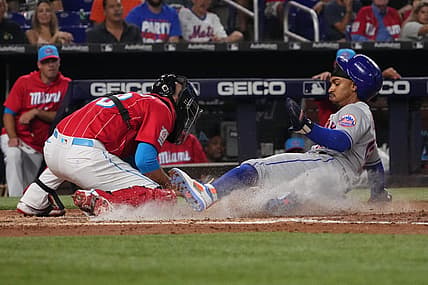 Sep 10, 2022; Miami, Florida, USA; New York Mets shortstop Francisco Lindor (12) scores a run in the third inning against the Miami Marlins at loanDepot park. Mandatory Credit: Jasen Vinlove-USA TODAY Sports