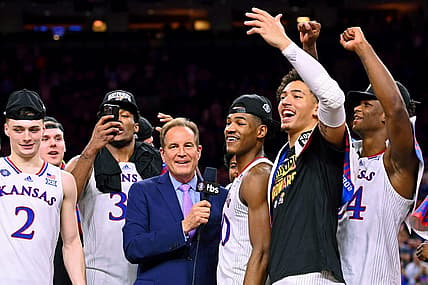 Apr 4, 2022; New Orleans, LA, USA; CBS announcer Jim Nantz interviews Kansas Jayhawks guard Ochai Agbaji (30) after their win against the North Carolina Tar Heels in the 2022 NCAA men's basketball tournament Final Four championship game at Caesars Superdome. Mandatory Credit: Bob Donnan-USA TODAY Sports