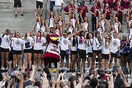 Apr 13, 2022; Columbia, SC, USA; The South Carolina Gamecocks women s basketball team during the playing of the school song as they hold their hands in the air in the shape of a  C  during their championship parade. Mandatory Credit: Jim Dedmon-USA TODAY Sports