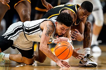 Vanderbilt guard Scotty Pippen Jr. (2) and VCU guard KeShawn Curry (11) dive for the ball during the second half at Memorial Gym in Nashville, Tenn., Wednesday, Nov. 17, 2021.

Vandy Vcu Mbb 111721 Aan 029