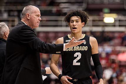 Feb 19, 2022; Stanford, California, USA; Colorado Buffaloes guard KJ Simpson (2) talks to head coach Tad Boyle during the second half against the Stanford Cardinal at Maples Pavilion. Mandatory Credit: John Hefti-USA TODAY Sports
