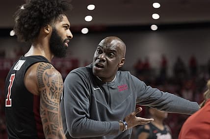 Mar 3, 2022; Houston, Texas, USA; Temple Owls head coach Aaron McKie talks to guard Damian Dunn (1) during a Houston Cougars time-out  in the first half at Fertitta Center. Mandatory Credit: Thomas Shea-USA TODAY Sports