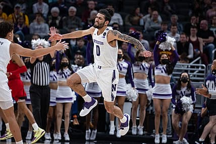 Mar 9, 2022; Indianapolis, IN, USA; Northwestern Wildcats guard Boo Buie (0) reacts to a made basket in the game against the Nebraska Cornhuskers at Gainbridge Fieldhouse. Mandatory Credit: Trevor Ruszkowski-USA TODAY Sports