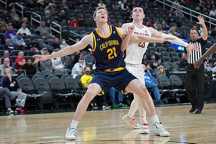 Mar 9, 2022; Las Vegas, Nevada, USA; California Golden Bears forward Lars Thiemann (21) blocks out Washington State Cougars forward Andrej Jakimovski (23) during the second half at T-Mobile Arena. Mandatory Credit: Stephen R. Sylvanie-USA TODAY Sports