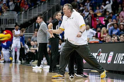 Mar 10, 2022; Kansas City, MO, USA; West Virginia Mountaineers head coach Bob Huggins speaks to referees after being ejected from the game during the first half against the Kansas Jayhawks at T-Mobile Center. Mandatory Credit: William Purnell-USA TODAY Sports