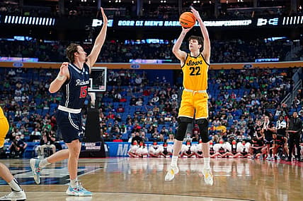 Mar 17, 2022; Buffalo, NY, USA; Iowa Hawkeyes forward Patrick McCaffery (22) shoots the ball against Richmond Spiders forward Matt Grace (15) in the second half during the first round of the 2022 NCAA Tournament at KeyBank Center. Mandatory Credit: Gregory Fisher-USA TODAY Sports