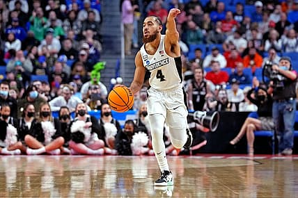Mar 19, 2022; Buffalo, NY, USA; Providence Friars guard Jared Bynum (4) brings the ball up court during the first half against the Richmond Spiders during the second round of the 2022 NCAA Tournament at KeyBank Center. Mandatory Credit: Gregory Fisher-USA TODAY Sports