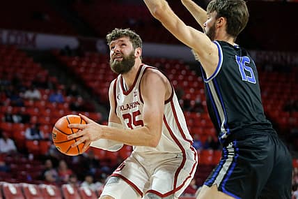 Oklahoma's Tanner Groves (35) looks to take a shot beside OCU's Jack McWilliams during a college basketball exhibition game between the University of Oklahoma Sooners (OU) and the Oklahoma City University Starts (OCU) at Loyd Noble Center in Norman, Okla., Tuesday, Oct. 25, 2022.

Ou Men S Basketball