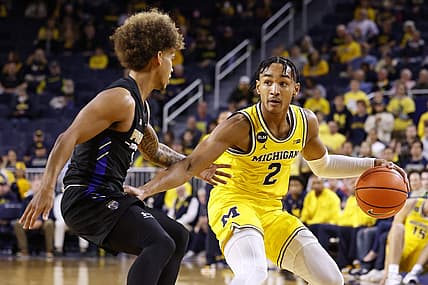 Nov 7, 2022; Ann Arbor, Michigan, USA; Michigan Wolverines guard Kobe Bufkin (2) dribbles defended by IPFW Mastodons guard Quinton Morton-Robertson (11) in the first half at Crisler Center. Mandatory Credit: Rick Osentoski-USA TODAY Sports