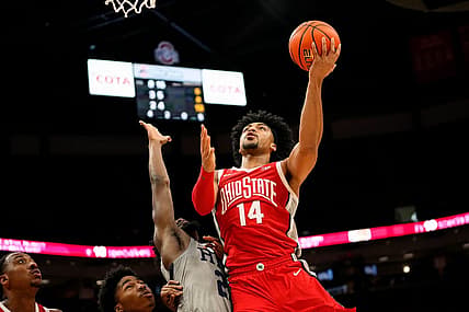 Nov 7, 2022; Columbus, Ohio, USA;  Ohio State Buckeyes guard Justice Sueing (14) shoots over Robert Morris Colonials guard Chris Ford (23) during the first half of the NCAA men's basketball game at Value City Arena. Mandatory Credit: Adam Cairns-The Columbus Dispatch

Basketball Robert Morris At Ohio State Men S Basketball