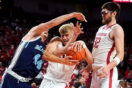 Nov 7, 2022; Lincoln, Nebraska, USA; Nebraska Cornhuskers guard Sam Griesel (5) fights for the ball against Maine Black Bears forward Peter Filipovity (44) during the second half at Pinnacle Bank Arena. Mandatory Credit: Dylan Widger-USA TODAY Sports