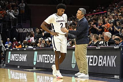 Nov 7, 2022; Charlottesville, Virginia, USA; Virginia Cavaliers guard Reece Beekman (2) has a chat with head coach Tony Bennett before taking a seat on the bench in game against North Carolina Central in the second half at John Paul Jones Arena. Mandatory Credit: Lee Luther Jr.-USA TODAY Sports