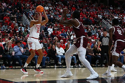 Nov 10, 2022; Lubbock, Texas, USA; Texas Tech Red Raiders forward Daniel Batcho (12) shoots the ball against Texas Southern Tigers forward Joirdon Karl Nicholas (5) in the first half at United Supermarkets Arena. Mandatory Credit: Michael C. Johnson-USA TODAY Sports