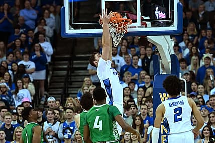 Nov 10, 2022; Omaha, Nebraska, USA; Creighton Bluejays center Ryan Kalkbrenner (11) dunks against the North Dakota Fighting Hawks during the first half at CHI Health Center Omaha. Mandatory Credit: Steven Branscombe-USA TODAY Sports