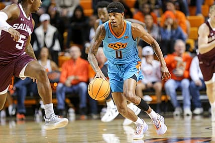 Oklahoma State guard Avery Anderson III (0) works his way up court during a college basketball game between the Oklahoma State Cowboys (OSU) and the Southern Illinois Salukis at Gallagher-Iba Arena in Stillwater, Okla., Thursday, Nov. 10, 2022.

Osu Vs Southern Illinois
