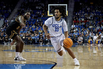 Nov 11, 2022; Los Angeles, California, USA;  UCLA Bruins guard Tyger Campbell (10) dribbles a ball against Long Beach State Beach during the first half at Pauley Pavilion presented by Wescom. Mandatory Credit: Kiyoshi Mio-USA TODAY Sports