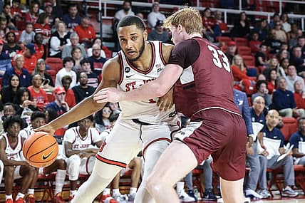 Nov 12, 2022; Queens, New York, USA;  St. John's Red Storm center Joel Soriano (11) posts up against Lafayette Leopards forward Leo O'Boyle (33) in the second half at Carnesecca Arena. Mandatory Credit: Wendell Cruz-USA TODAY Sports
