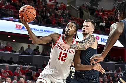 Nov 14, 2022; Houston, Texas, USA; Houston Cougars guard Tramon Mark (12) goes up for the lay up during the second half against the Oral Roberts Golden Eagles at Fertitta Center. Mandatory Credit: Maria Lysaker-USA TODAY Sports