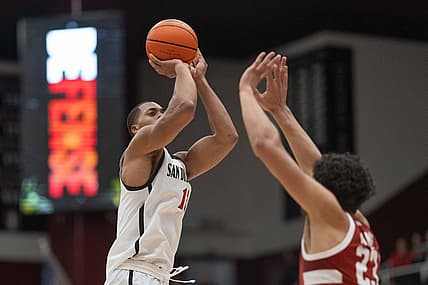 Nov 15, 2022; Stanford, California, USA;  San Diego State Aztecs forward Jaedon LeDee (13) shoots over Stanford Cardinal forward Brandon Angel (23) during the first half at Maples Pavilion. Mandatory Credit: Stan Szeto-USA TODAY Sports