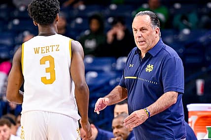 Nov 16, 2022; South Bend, Indiana, USA; Notre Dame Fighting Irish head coach Mike Brey talks to guard Trey Wertz (3) in the second half against the Southern Indiana Screaming Eagles at the Purcell Pavilion. Mandatory Credit: Matt Cashore-USA TODAY Sports