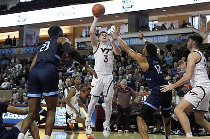 Nov 17, 2022; Charleston, South Carolina, USA; Virginia Tech Hokies guard Sean Pedulla (3) shoots the ball over Old Dominion Monarchs forward Ben Stanley (12) in the second half at TD Arena. Mandatory Credit: David Yeazell-USA TODAY Sports
