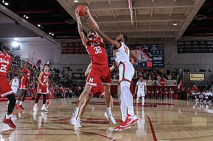 Nov 17, 2022; Queens, New York, USA; Nebraska Cornhuskers forward Wilhelm Breidenbach (32) and St. John's Red Storm center Joel Soriano (11) battle for a rebound in the first half at Carnesecca Arena. Mandatory Credit: Wendell Cruz-USA TODAY Sports