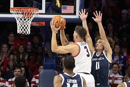 Nov 17, 2022; Tucson, Arizona, USA; University of Arizona Wildcats guard Pelle Larsson (3) goes up for a shot against Utah Tech guard Noa Gonsalves (11) in the first half at McKale Center. Mandatory Credit: David Cruz-USA TODAY Sports