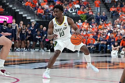 Nov 18, 2022; Las Vegas, Nevada, USA;  Baylor Bears guard Adam Flagler (10) dribbles against the Virginia Cavaliers during the second half at T-Mobile Arena. Mandatory Credit: Stephen R. Sylvanie-USA TODAY Sports