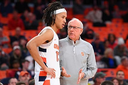 Nov 15, 2022; Syracuse, New York, USA; Syracuse Orange head coach Jim Boeheim talks with forward Benny Williams (13) against the Colgate Raiders during the second half at the JMA Wireless Dome. Mandatory Credit: Rich Barnes-USA TODAY Sports
