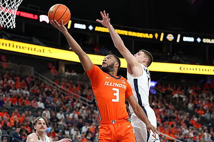 Nov 20, 2022; Las Vegas, Nevada, USA; Illinois Fighting Illini guard Jayden Epps (3) shoots inside the defense of Virginia Cavaliers guard Isaac McKneely (11) during the first half at T-Mobile Arena. Mandatory Credit: Stephen R. Sylvanie-USA TODAY Sports