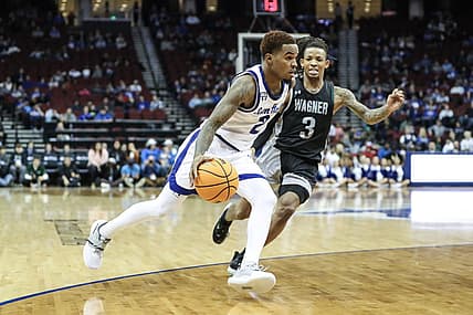 Nov 20, 2022; Newark, New Jersey, USA;  Seton Hall Pirates guard Al-Amir Dawes (2) drives past Wagner Seahawks guard DeLonnie Hunt (3) in the first half at Prudential Center. Mandatory Credit: Wendell Cruz-USA TODAY Sports