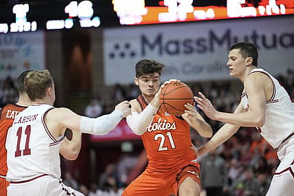 Nov 20, 2022; Charleston, South Carolina, USA; Virginia Tech Hokies forward Grant Basile (21) fights for a rebound in the first half against the Charleston Cougars at TD Arena. Mandatory Credit: David Yeazell-USA TODAY Sports