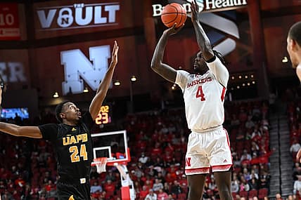 Nov 20, 2022; Lincoln, Nebraska, USA;  Nebraska Cornhuskers forward Juwan Gary (4) attempts a three point basket against Arkansas-Pine Bluff Golden Lions guard AC Curry (24) during the first half at Pinnacle Bank Arena. Mandatory Credit: Steven Branscombe-USA TODAY Sports