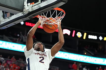 Nov 20, 2022; Las Vegas, Nevada, USA; Virginia Cavaliers guard Reece Beekman (2) dunks against the Illinois Fighting Illini during the second half at T-Mobile Arena. Mandatory Credit: Stephen R. Sylvanie-USA TODAY Sports